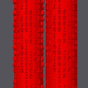 May include: Two bright red cylindrical objects, each with a repeating pattern of numbers and symbols. One has a textured, raised pattern, the other a smoother surface. The background is grey. The objects are likely decorative.