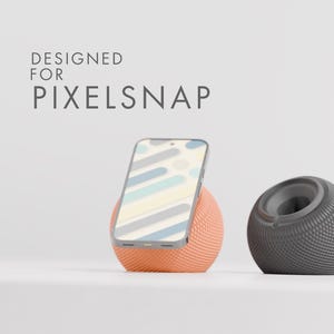 Könnte beinhalten: Ein Set aus drei Keramikbechern mit gesprenkelter, matter Oberfläche. Die Becher sind in den Farbtönen Creme, Hellgrau und Dunkelgrau gehalten. Jeder Becher hat ein schlichtes, minimalistisches Design, ideal für Kaffee oder Tee.