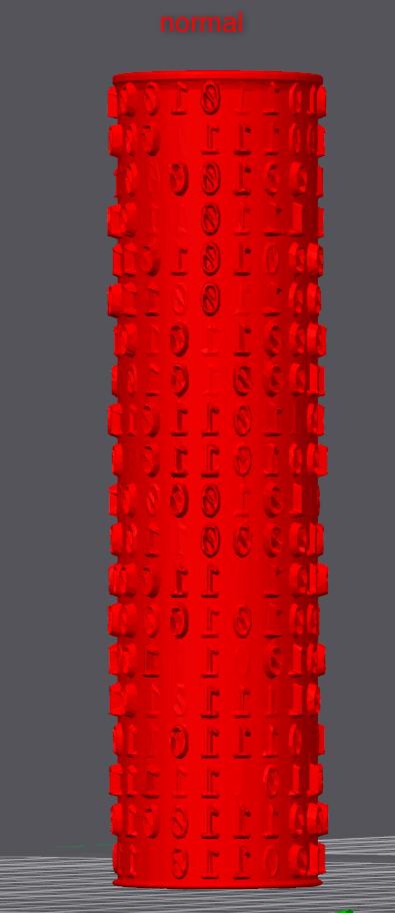 May include: A tall, red cylindrical object featuring a repeating pattern of symbols and numbers. The word "normal" is at the top. The object has a textured surface against a grey background.