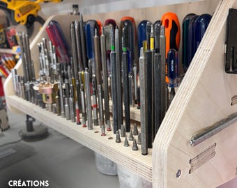 Wall-mounted holder for screwdrivers and screwdriver bits