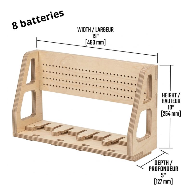 May include: A wooden battery organizer with a width of 19 inches (483 mm), a height of 10 inches (254 mm), and a depth of 5 inches (127 mm). It has multiple slots and holes for storing batteries. The text "8 batteries" is visible.