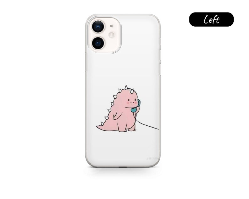 May include: Clear phone case featuring a cartoon pink dinosaur holding a blue telephone receiver. The dinosaur has spiky protrusions along its back. The phone case is designed for a smartphone.