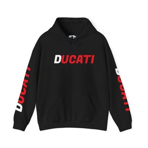 May include: Black hooded sweatshirt with the word "DUCATI" in red and white lettering on the front and the word "DUCATI" vertically on the sleeves.