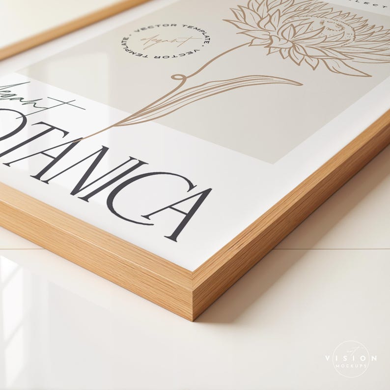 May include: A framed print with a beige background and a line drawing of a flower in brown. The text "Botanica" is printed in black at the bottom of the print.