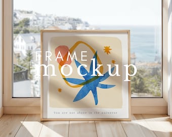 Square Frame Mockup On Floor PSD Smart Object Frame Leaning Against Window Mockup Summer Sea View Background
