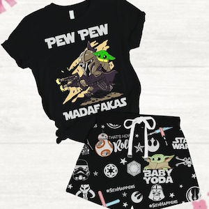 May include: Black and green pyjama set featuring a Star Wars theme. The top has a graphic of a Mandalorian character with a Baby Yoda character on his shoulder. The text "I Pew Pew Madafakas" is printed on the top. The shorts have a variety of Star Wars characters and symbols, including Baby Yoda, R2-D2, Darth Vader, and the Death Star. The text "#SithHappens" is printed on the shorts.