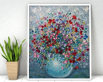 May include: A framed oil painting featuring a thick impasto texture of a vibrant floral bouquet in a light blue vase. The flowers are rendered in shades of red, pink, purple, and blue against a textured, pale gray and blue background.