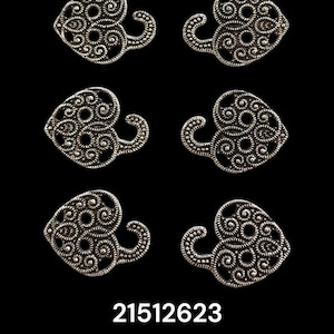 May include: Six silver filigree heart-shaped charms with a swirl design. The charms have a hook on the side. The charms are arranged in two rows of three. The image also includes the number 21512623.