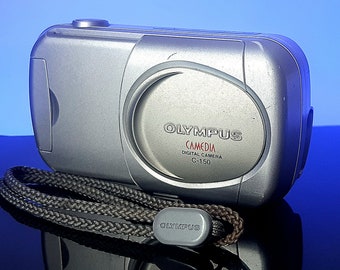 Olympus CAMEDIA C-150 2.0MP Digital Point and Shoot Camera WORKING. C150 2.5x zoom digital camera