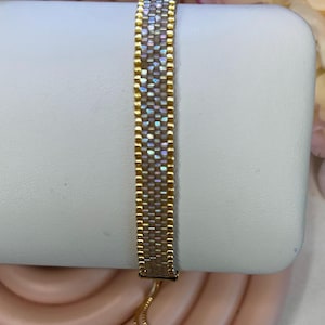 Handmade Miyuki bead bracelet: slider chain with 18-karat gold plating.