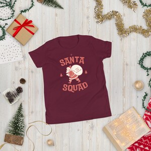 Santa Squad Funny Christmas Shirt, Perfect Family Holiday Attire for Christmas Festivities, Great Gift Idea