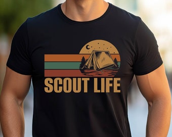 May include: A black t-shirt with a retro-style graphic of a tent and the text "Scout Life".