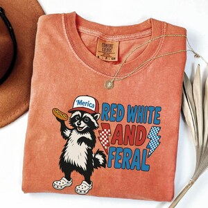 Funny Raccoon 4th Of July Shirt: Red White & Feral Comfort Colors Tee