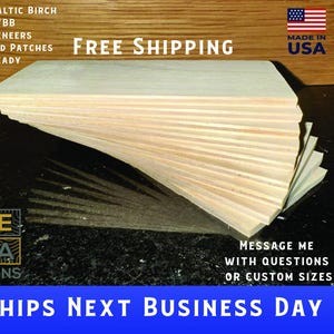 May include: Stack of 3-ply Baltic birch wood veneer sheets, laser ready, with thick veneers and minimized patches.  The wood is light brown and has a smooth surface.  The text "FREE SHIPPING" is printed in black on a white background.  The text "MADE IN USA" is printed in black on a white background.  The text "SHIPS NEXT BUSINESS DAY" is printed in white on a blue background.