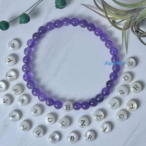 Vendita online gioielli e mala - braccialetti elasticizzati con perline da 8 mm
