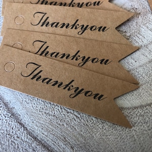 Etichette regalo in carta kraft con la scritta Grazie Grazie Naturale. Confezione da 50 etichette