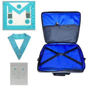 May include: A turquoise Masonic regalia set with a white collar, a white apron with turquoise trim, and a matching collar. The set comes with a black carrying case with a blue interior and white gloves.