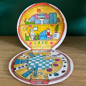 90年代のおもちゃのポケットゲームにインスパイアされたインタラクティブな磁気誕生日グリーティングカード ノスタルジックなかわいいミニチュアミレニアル貝殻カフェポリー漫画