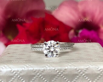 2.00-Ct Round Moissanite Ring in 10KT White Gold. Perfect for engagements or anniversaries. Gift her brilliance.