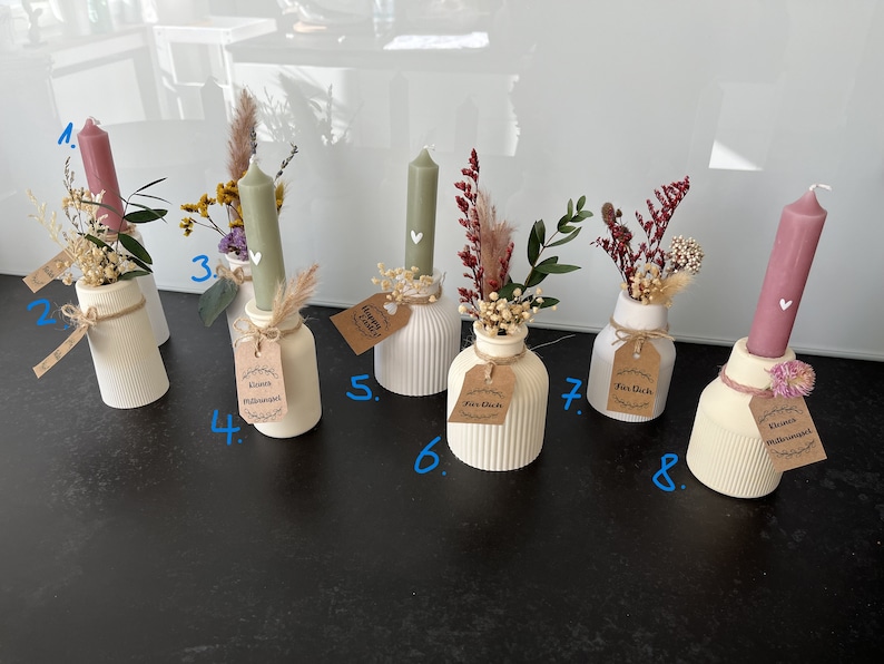 Verschiedene Vasen aus Keraflott in weiß oder beige Bild 1
