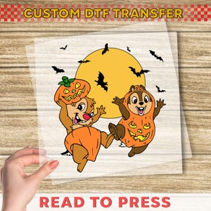 May include: DTF transfer with two cartoon chipmunks in Halloween costumes, one holding a pumpkin. A full moon and bats are in the background. The text "CUSTOM DTF TRANSFER" and "READ TO PRESS" are at the top and bottom.