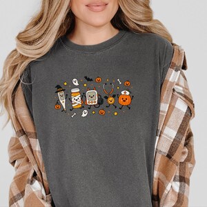Maglietta da infermiera per Halloween, regalo spettrale per infermiera, maglietta medica per Halloween, maglietta da infermiera pediatrica, felpa per ospedale per Halloween immagine 5