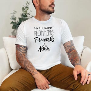 Dark Humour Shirt, My Therapist Recommends Fireworks and Alibis, Adult Sarcasm Tee, Fourth of July Gift, True Crime Humor., Mischief Maker image 3
