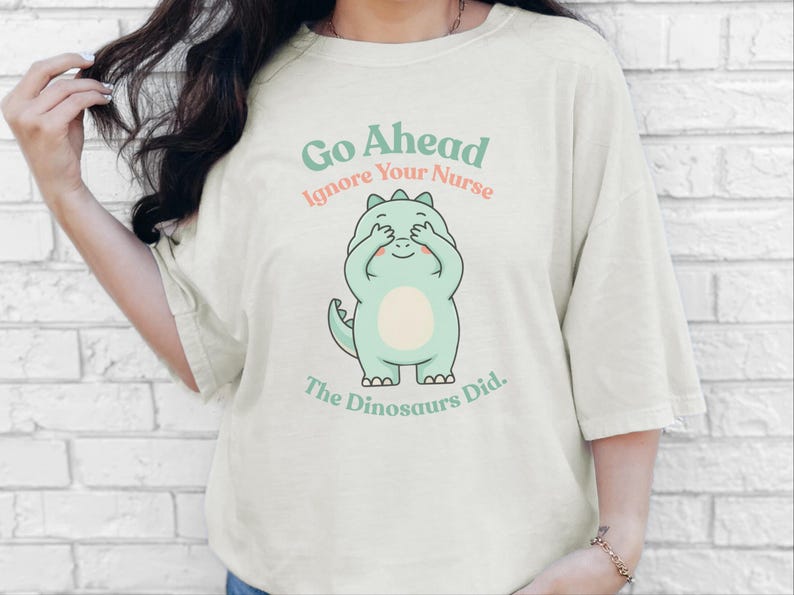 Comfort Colors Sarcastic Nurse T-Shirt, Go Ahead Ignore Your Nurse The Dinosaurs Did, Pediatric RN Healthcare Top, Funny Nurse Shirts image 2