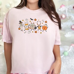 Maglietta da infermiera per Halloween, regalo spettrale per infermiera, maglietta medica per Halloween, maglietta da infermiera pediatrica, felpa per ospedale per Halloween immagine 7
