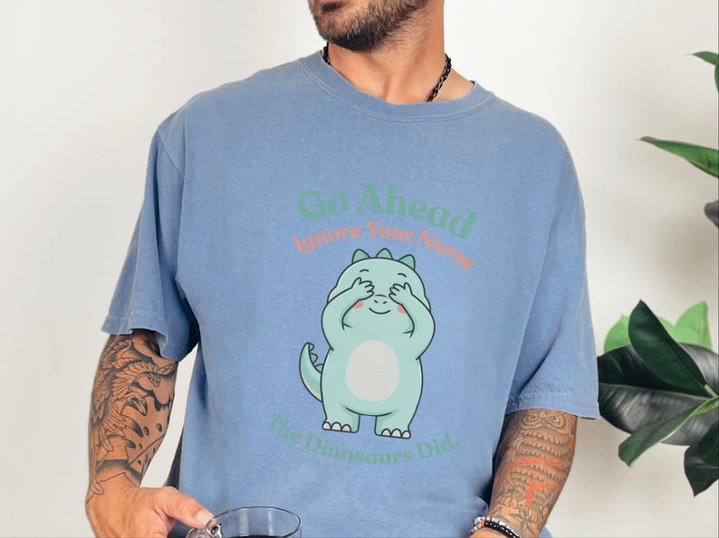 Comfort Colors Sarcastic Nurse T-Shirt, Go Ahead Ignore Your Nurse The Dinosaurs Did, Pediatric RN Healthcare Top, Funny Nurse Shirts image 1