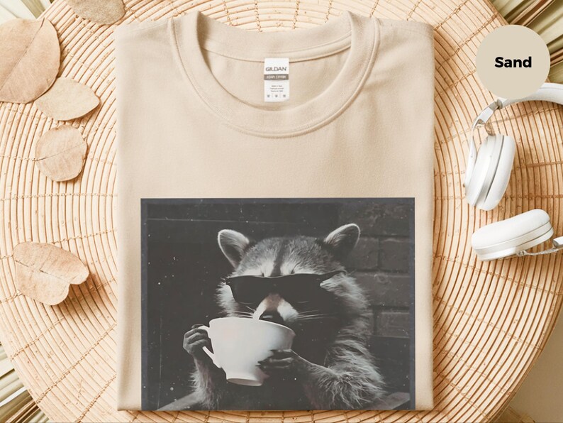 Funny Raccoon Sipping A Cup Of Tea Tee, Sarcastic Trash Panda Retro Wildlife Graphic Shirt, Humorous Animal Lover Tea Drinker Gift image 1