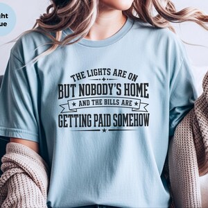 Funny Adult Humor Shirt, Sarcastic Adulting Tee, The Lights Are On But Nobody's Home and Bills Are Getting Paid Somehow, Gen X Gift image 5
