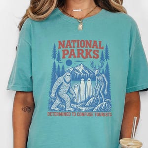 National Park Shirt, Bigfoot Cryptid Gift, Funny Camping Shirt, Retro Sasquatch Tee, Determined To Confuse Tourists image 1