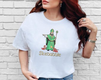 Skedaddle St. Patrick Kicking Snakes Out Shirt - Funny Irish Drinking Tee, Religious Parody Graphic, Holy Humor St. Paddy's Day, Irish Shirt