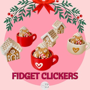 May include: A festive image featuring gingerbread house-shaped fidget clickers. The clickers are in red and cream-colored mugs, with a pink background and a decorative wreath. The text "FIDGET CLICKERS" is displayed at the bottom.