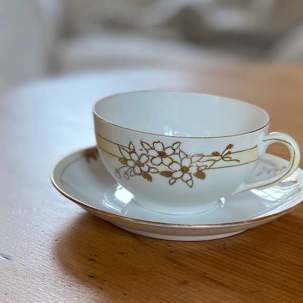 Vintage Nippon Tea Cup and Saucer from the 1940s. No damage of any kind. Cup holds 4 oz. tea or coffee. Very delicate.