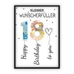May include: A white card with black text and a black frame. The text reads "KLEINER WUNSCHERFÜLLER" and "Happy Birthday to you". The number 18 is made of euro bills and is floating with strings attached to the text.