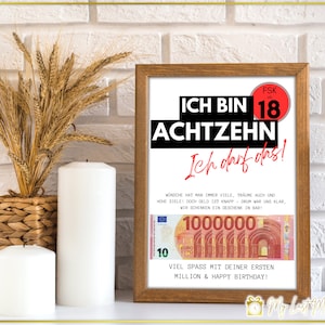 Puede incluir: Una impresi&oacute;n enmarcada con un dise&ntilde;o en blanco y negro que dice "Ich bin 18 Achtzehn Ich darf das!" con un c&iacute;rculo rojo alrededor del n&uacute;mero 18. La impresi&oacute;n tambi&eacute;n incluye una imagen de un billete de 1.000.000 euros y el texto "Viel Spass mit deiner ersten Million & Happy Birthday!"