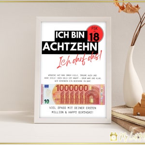 Puede incluir: Una impresi&oacute;n enmarcada en blanco con el texto "ICH BIN 18 ACHTZEHN Ich darf das!" en negro y rojo. La impresi&oacute;n tambi&eacute;n incluye una maqueta de un billete de 1.000.000 de euros con el texto "VIEL SPASS MIT DEINER ERSTEN MILLION & HAPPY BIRTHDAY!"