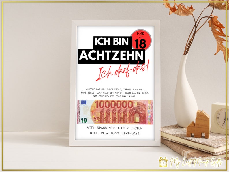 Puede incluir: Una impresi&oacute;n enmarcada en blanco con el texto "ICH BIN 18 ACHTZEHN Ich darf das!" en negro y rojo. La impresi&oacute;n tambi&eacute;n incluye una maqueta de un billete de 1.000.000 de euros con el texto "VIEL SPASS MIT DEINER ERSTEN MILLION & HAPPY BIRTHDAY!"