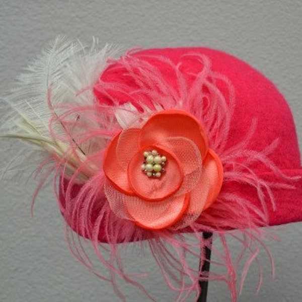 Wet felted art hat with silk flower and feathers.