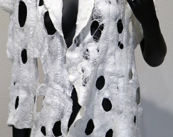 Nuno felted white holey scarf. Worn numerous ways.