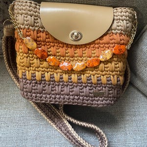 beige hand-woven crochet wallet