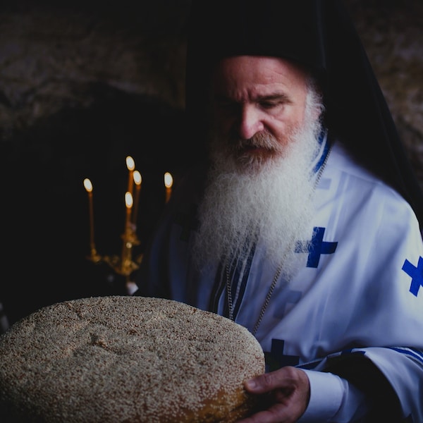 The priest, by YaLos Photography.