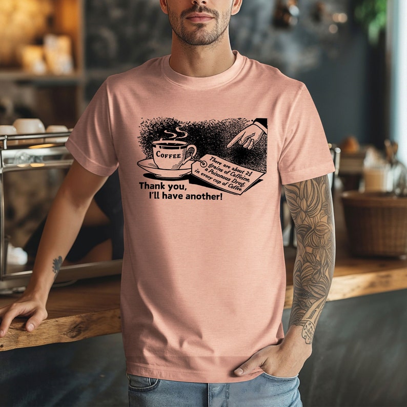 This humorous shirt depicts an old time image of a steaming coffee cup with a hand and finger pointing to a tag stating the many dangers of coffee and caffeine. "Thank you, I'll have another" is written underneath.