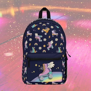 May include: A dark blue backpack featuring a repeating pattern of roller skates, daisies, rainbows, and lightning bolts. The front pocket displays a single large roller skate with wings positioned above a colorful rainbow arc and yellow stars.