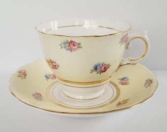Vintage Colclough Teetasse und Untertasse Set, Muster 6597, Gelb mit bunten Blumen, 1940er Jahre