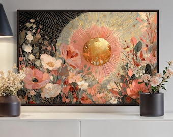 Pode incluir: Uma impressão de arte floral emoldurada com uma borda preta. A obra apresenta um design de explosão solar com tons rosa e dourado, rodeado por flores em tons de rosa, branco e vermelho. Dois vasos com flores secas e frescas estão no armário branco.