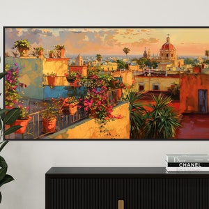 This colorful painting shows a Mexican city at sunset with terracotta rooftops, blooming bougainvillea, and church domes. The warm hues and intricate details evoke the charm and beauty of a picturesque Mexican town, perfect for cultural decor.
