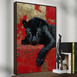 Striking art print of a black panther resting against a rich red and gold abstract background. The panther’s piercing gaze, sleek dark fur, and powerful presence create a dramatic and luxurious statement piece, blending wildlife majesty with bold modern art design for a captivating interior accent.